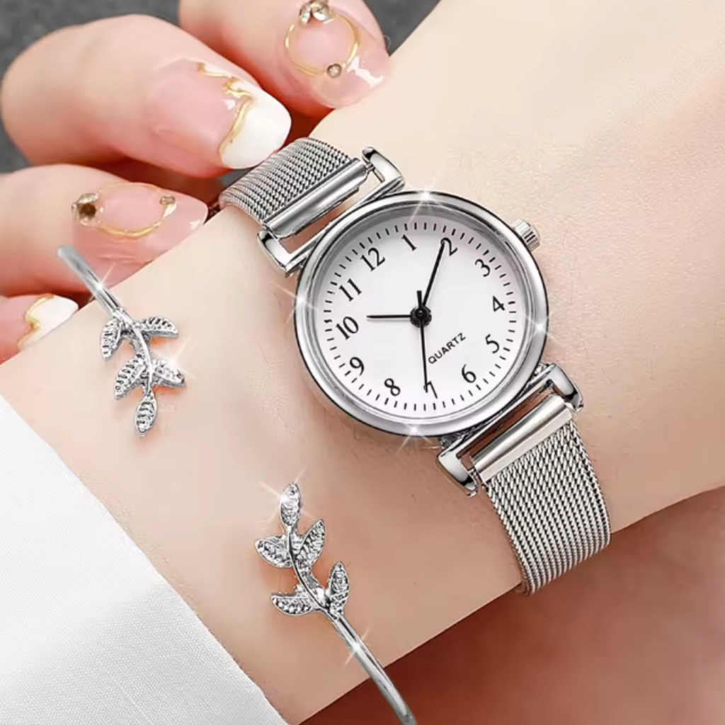 Montre Bracelet Femme – Élégance simple au quotidien. Une montre qui aille la simplicité et sophistication. Son design épuré avec des chiffres visibles et son bracelet de type milanais le rendent parfait pour les femmes à la recherche de la élégance.