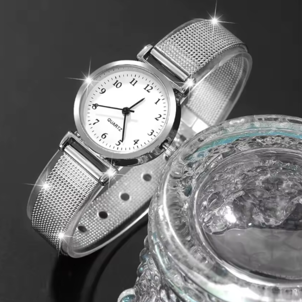 Montre Bracelet Femme – Élégance simple au quotidien. Une montre qui aille la simplicité et sophistication. Son design épuré avec des chiffres visibles et son bracelet de type milanais le rendent parfait pour les femmes à la recherche de la élégance.