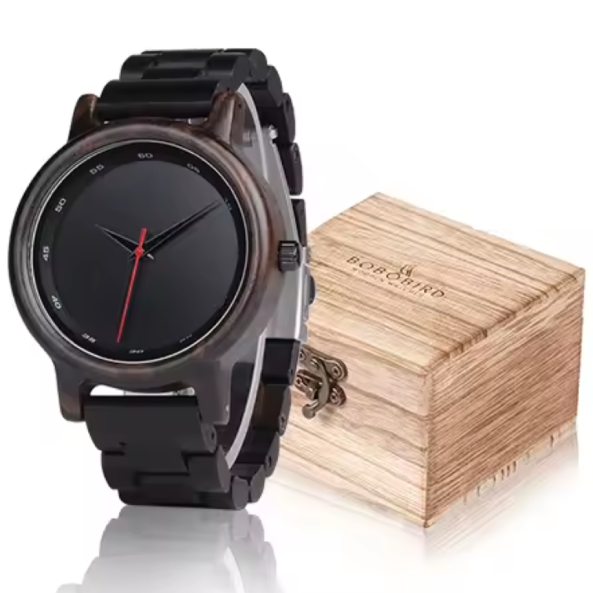 Montre BOBO BIRD en Bois d'Ébène pour Hommes et Femmes. Cette montre redéfinit l’élégance moderne avec son design entièrement noir et une aiguille rouge unique qui la distingue par son caractère, fabriqué en bois foncé.