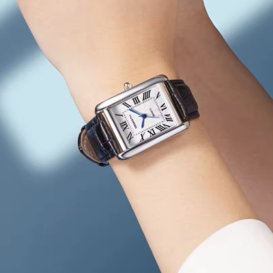 Petite montre carrée Simple de Style rétro, échelle romaine, mouvement à Quartz. La silhouette rectangulaire et les détails classiques font de cette montre une pièce essentielle pour ceux qui apprécient la distinction.